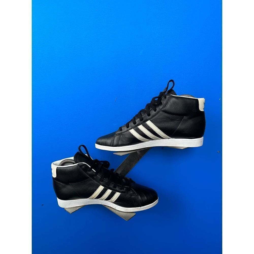 Vintage
2006 Adidas Sleek Series Black Leather Pro Model High Top Sneaker Sz 6.5
